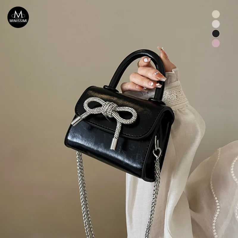 Sac a Main Bow Lock